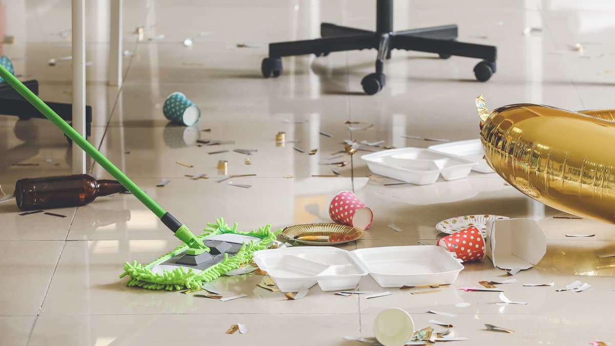 Overlooked kitchen floor mess in a Bellevue home, including debris, spills, and hard-to-reach areas that need deeper cleaning.
